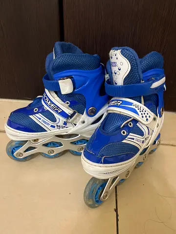 Blue adjustable inline roller skates - good condition