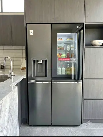 Selling a premium LG InstaView ThinQ Side-by-Side Refrigerator