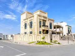 Classic Corner Villa for Sale in Al Helio 2 – Ajman | Prime Location | Rooftop
