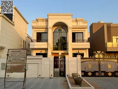 Freehold villa in one of Ajman's most prestigious areas, on a main street, with a price including electricity, water, and air conditioning.