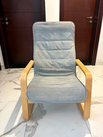 Light wooden frame lounge chair with grey fabric seat