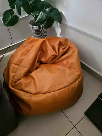 Used large tan leather bean bag chair - comfortable lounge seating