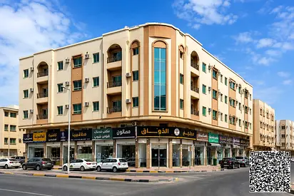 فرصة للمستثمرين: بناية زاوية على الشارع الرئيسي في الروضة 2 بدخل مميز