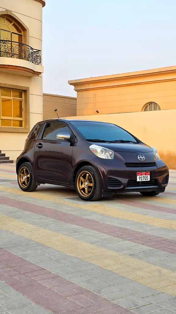 Toyota IQ 2012 — photo 1 of 17
