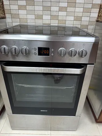 Used built-in stainless steel electric oven in good working condition.