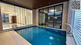 A modern villa in Al Yasmin, elegant design and thoughtfully planned spaces in a sophisticated style