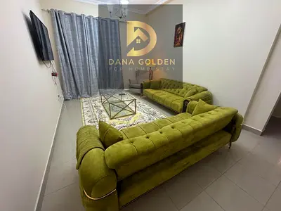 Two bedrooms and a living room with two balconies, fully furnished, for monthly rent in Sharjah/Al Qasimia