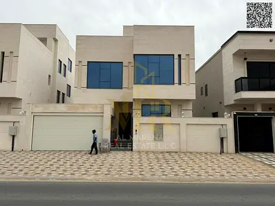 Villa in one of Ajman's most prestigious areas, on a main street, with a price including registration fees and air conditioning, located close to amen