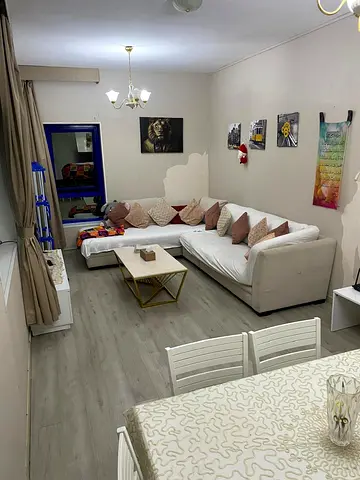 Super-furnished 2-bedroom apartment with a living room on the Ajman Corniche – 3,500.