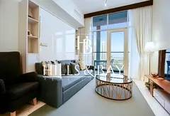 Luxury Convertible 1-Bed | Steps from Dubai Canal