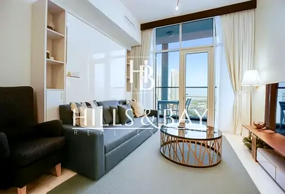 Luxury Convertible 1-Bed | Steps from Dubai Canal