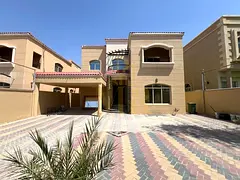 Residential/commercial villa for sale in Al Muwaihat 1, behind Nesto. Area: 5000 sq ft | Large yard