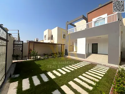 Luxury corner villa with 5 master bedrooms in Al Muwaihat 1, including electricity, water, and air conditioning, at a special price.