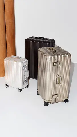 Rimowa cabin silver plus large carry on black plus trunk gold