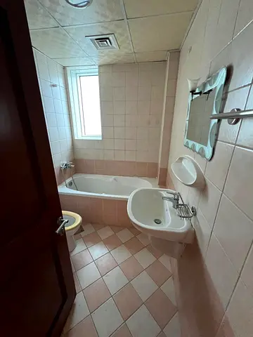 Three bedrooms, a living room, and a master maid's room in cooperation, Al Saad Tower