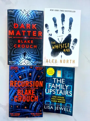 Set of 4 Thriller/Sci‑Fi Paperbacks (READ DESCRIPTION)