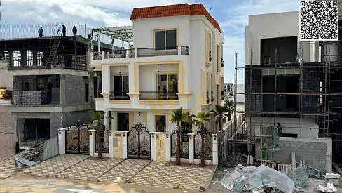 Luxury villa in Al Bahia with a swimming pool and high-end finishes, price includes electricity, water, and air conditioning.