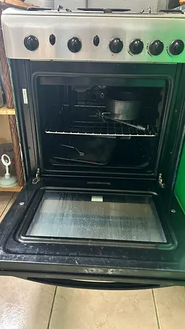 Used freestanding gas oven and electric oven and grill with stove top - good working condition