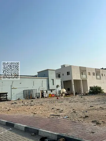 قطعة أرض تجارية وسكنية للبيع في المنطقة الصناعية 1، عجمان - تقع مباشرة على شارع السلام.