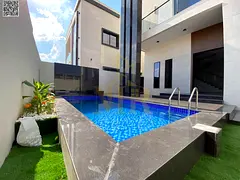 Two-story villa with a swimming pool, located close to amenities, luxurious finishing, registration