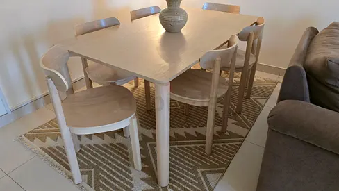 Light wood 6-seater dining table with chairs