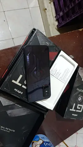 Used Infinix GT smartphone with original box - good condition