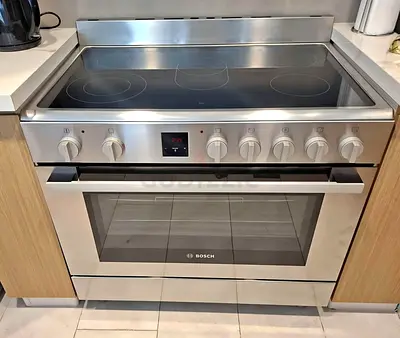 Bosch stainless steel electric range with ceramic hob and oven 90x60cm