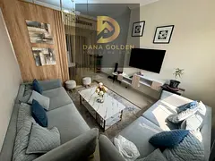 Two bedrooms, two living rooms, maid's room, balcony, and two bathrooms, fully furnished with in