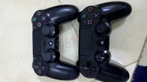 Sony PS4 Slim 500GB Console with 2 Controllers + 3 Games