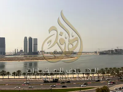 One-bedroom apartment with a living room and balcony in Al Qasba – Free A/C – Free pool and gym – Free parking – Prime location.
