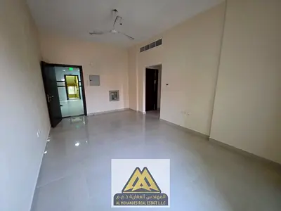 Annual rental: Spacious 1-bedroom apartment with a living room and a balcony offering an open view in Al Rumaila 1, near Ajman Corniche. Prime locatio