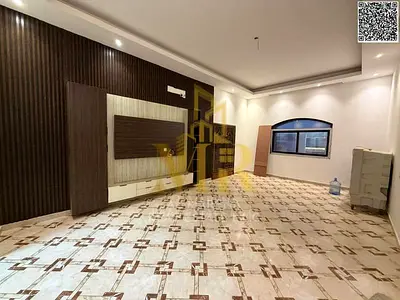 Luxury Villa on the Main Street in Al Muwaihat 1: Two Floors and a Rooftop in an Exceptional Location with Comprehensive Services