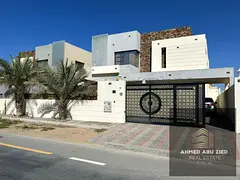 5 master bedrooms with furnishings, 2 living rooms, a men's majlis, a maid's room, parking f