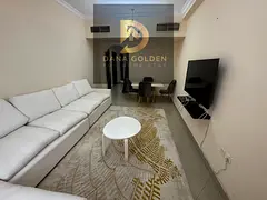Two bedrooms, a living room, two bathrooms, and a balcony for monthly rent in Sharjah, Al Taawun are
