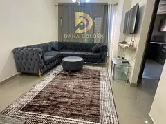One-bedroom apartment with living room, bathroom, and balcony, furnished with hotel-style furniture,