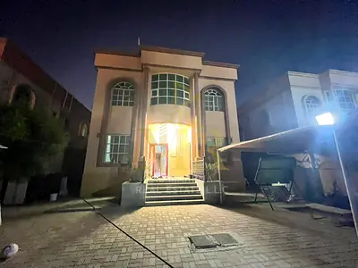 Luxury villa for sale in Al Rawda 2, Ajman – 5000 sq ft, priced at AED 1,450,000 including electricity, water, and air conditioning.