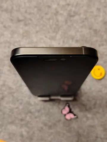 Black Apple iPhone with Screen Protector