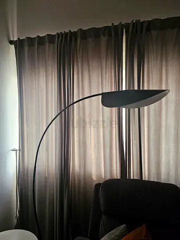 Tall black arc floor lamp with leaf-shaped shade - good condition