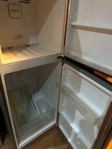 Compact under-counter refrigerator in good working condition