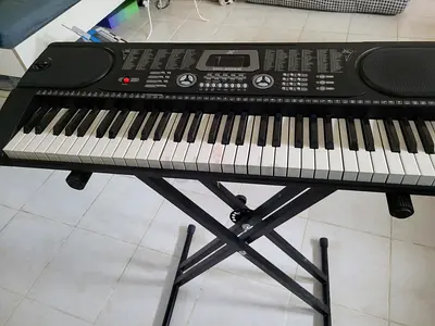 Portable 61-Key Electronic Keyboard with Stand - Good Condition