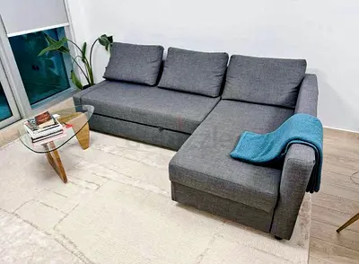 IKEA L shap Sofa store cum bed you can fix the storage lift or Right any side you want is available