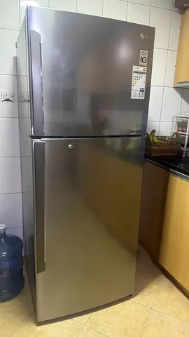 LG Stainless Steel Top Freezer Refrigerator - Good Condition