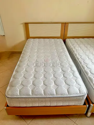 2 Single beds with mattress