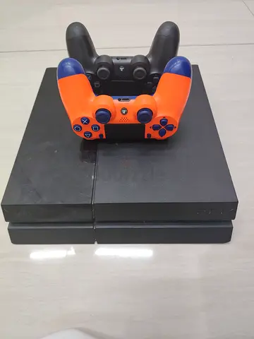 Sony PlayStation 4 Slim with 2 Controllers (Good Working Condition)