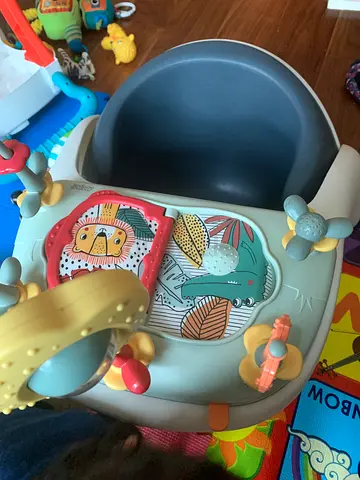 Baby activity seat with toys - gently used