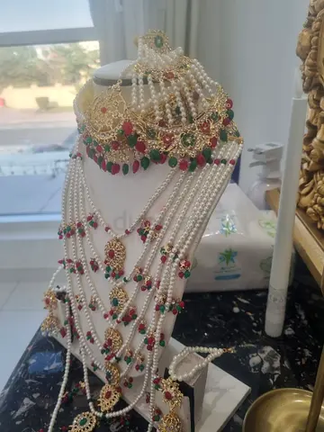 Traditional multi-layer bridal haar with pearls and kundan stones