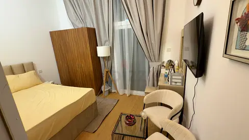 Elegant and spacious partitions available in a beautifully furnished apartment. Bright rooms, modern