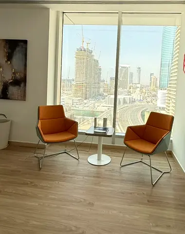 Pair of modern orange lounge chairs - excellent condition