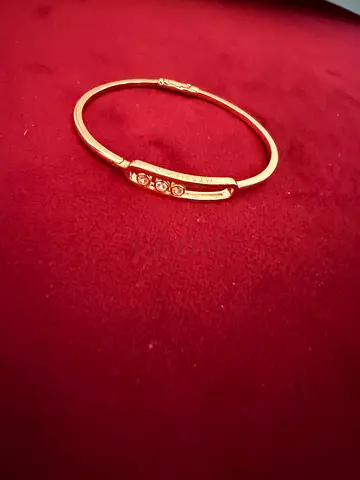 Gold-tone womens bracelet with three small stones - elegant bangle