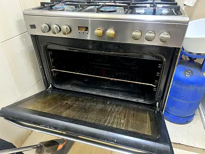 5-burner Stainless Steel Gas Cooker with Oven - Used, Working